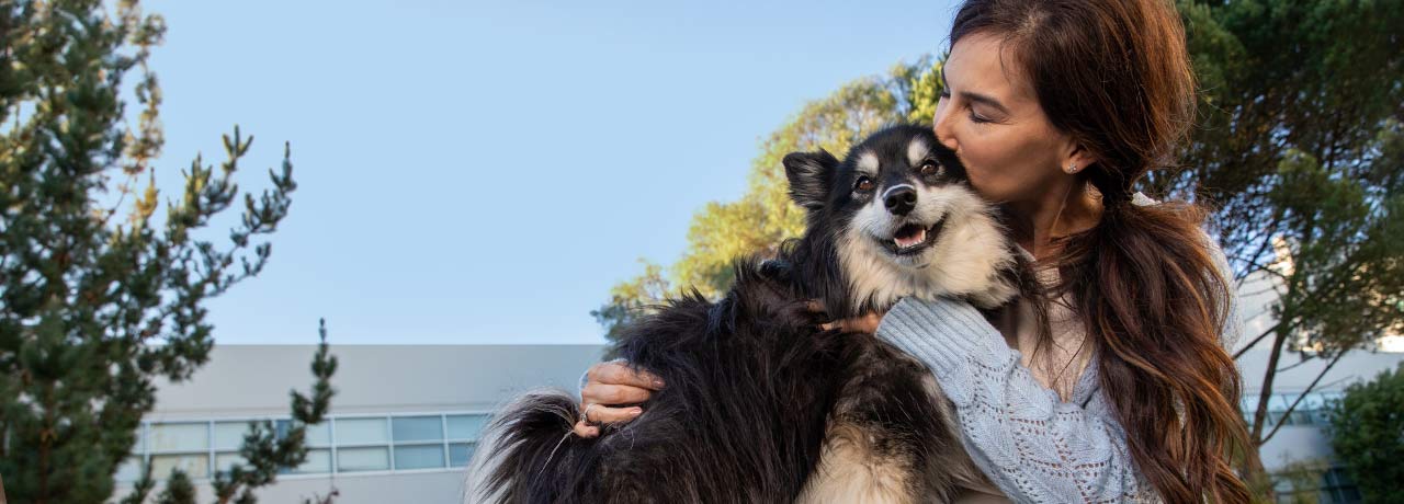 A dog and its owner showing just how much they love each other.