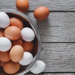 white and brown eggs in bowl