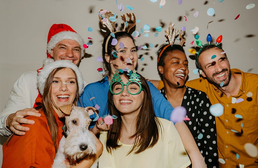 people partying with a dog