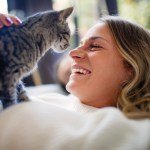 happy woman with cat