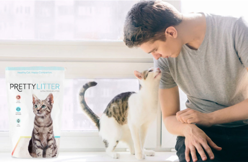 Man with cat and Pretty Litter