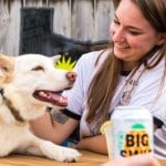 woman and dog smiling