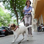 Woman being pulled by her dog.